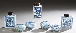 Group of Seven Chinese Blue and White Porcelain Jars, 20th c., three square with wooden lids, and four circular examples with double happiness symbols