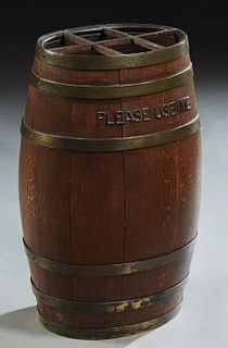 English Brass Bound Oval Oak Barrel Umbrella Stand, early 20th c., with the words "Please Use Me," in relief iron letters, on one side, H.- 25 3/4 in.
