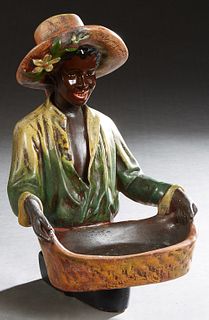African American Figural Polychromed Ceramic Calling Card Tray, 20th c., H.- 15 in., W.- 9 1/2 in., D.- 11 in.
