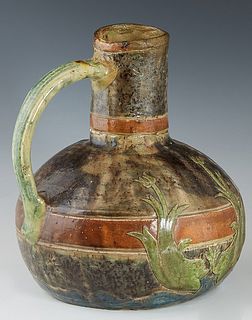 English Pottery Ewer, 19th c., with relief floral and fish decoration, H.- 10 1/2 in., W.- 9 3/8 in., D.- 8 1/2 in.