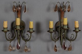 Pair of Bronze Three Light Sconces, c. 1940, the circular back plate issuing a rod with three colored tear drop prisms, and three curved candle arms h