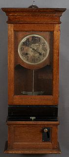 Carved Oak Time Clock, c. 1912, by Cincinnati Time Recorder Co., H.- 40 in., W.- 15 in., D.- 9 in.