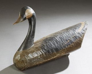 Hand Carved Canadian Goose Decoy, early 20th c., with original paint, H.- 15 in., W.- 29 in., D.- 9 in.