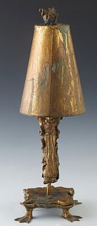 Paul Gruer (New Orleans), "Table Lamp on Duck Feet," 20th c., mixed media, with a gilt conical shade on a clay support, to a square base on four corne