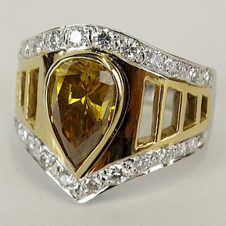 Lady's Approx. 2.40 Carat Pear Shape Fancy Brown Yellow Diamond, .60 Carat Round Cut Diamond and 14 Karat Yellow and White Gold Ring.