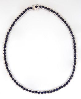 14K White Gold Link Necklace, each of the 82 links with an oval faceted blue sapphire bordered on two sides by tiny white diamonds, total sapphire wei