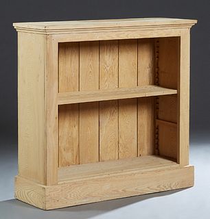 Louisiana Carved Cypress Open Bookshelf, 20th c., the rectangular top over two adjustable shelves, H.- 42 in., W.- 44 1/2 in., D.- 14 1/4 in.