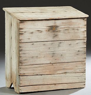 Louisiana Carved Cypress Storage Bin, 19th c., the slanted top on iron strap hinges, over a cypress board front and sides, H.- 34 1/4 in., W.- 32 in.,