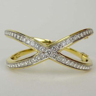 Lady's Approx. 8.0 Carat Round Cut Diamond and Heavy 18 karat Yellow Gold X Form Bangle Bracelet.