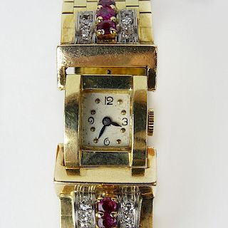 Lady's Retro 14 Karat Yellow Gold, Ruby and Single Cut Diamond Bracelet Watch.