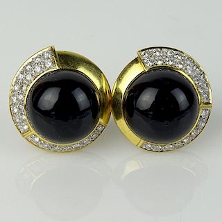 Lady's Vintage Approx. 2.0 Carat Round Cut Diamond, 18 Karat Yellow Gold and Onyx Button Ear Clips.
