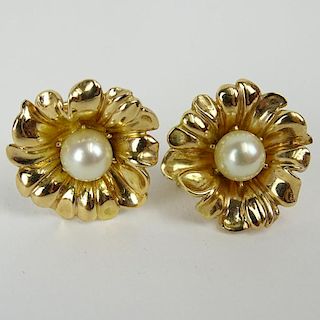 Lady's Pearl and 14 Karat Yellow Gold Flower Earrings.