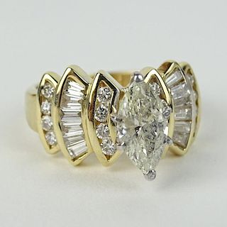 Lady's Approx. 1.08 Carat Marquise Cut Diamond and 14 Karat Yellow Gold Engagement Ring.