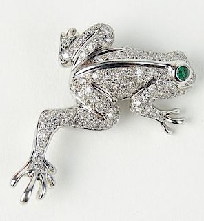 Lady's 18 Karat White Gold and Pave Set Diamond Frog Brooch with Cabochon Emerald Eyes.