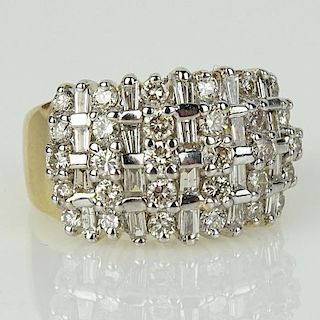 Lady's Approx. 2.0 Carat Round and Baguette Cut Diamond and 14 Karat yellow Gold Ring.