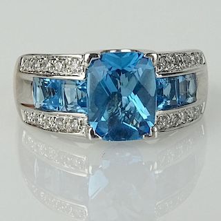 Lady's London Blue Topaz, Diamond and 14 karat White Gold Ring.