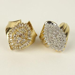 A Lady's Diamond and 10 Karat Yellow Gold Cluster Ring and a Lady's Diamond and 14 Karat Yellow Gold Cluster Ring.