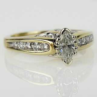 Lady's Approx. .31 Carat Marquise Cut Diamond and 14 Karat Yellow Gold Engagement Ring.