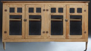 Louisiana Carved Cypress Hanging Cabinet, 20th c., the ogee crown over two pair of mullioned glass doors, H.- 33 1/4 in., W.- 75 in., D.- 15 in.