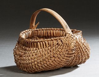 Native American Split Hickory Handled Buttocks Basket, 20th c., probably Cherokee, H.- 8 1/2 in., W.- 10 in., D.- 9 in.