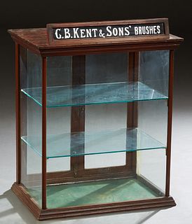 Carved Birch Table Top Display Case, for "G.B. Kent and Sons Brushes," with three glazed sides and glazed double doors at the rear, H.- 29 in., W.- 22