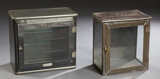Two Iron Medical Table Top Cabinets, early 20th c., one with a glass front door and sides; the second with a glass front door, H.- 16 in., W.- 14 3/4 