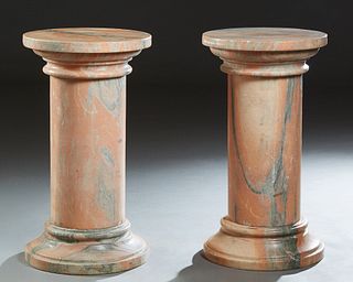 Pair of Pink and Gray Marble Pedestals, 20th c., the stepped circular tops over cylindrical supports, to stepped circular bases, H.- 35 1./2 in., Dia.