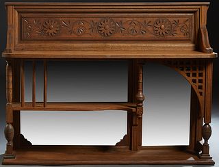 Carved Oak Back Bar, c. 1900, the stepped crown over a floral carved frieze, to a rounded edge shelf, with latticed brackets, and a lower half shelf, 