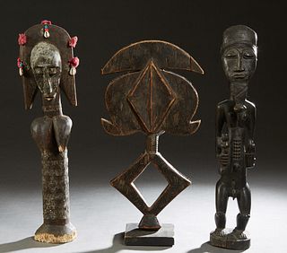 Group of Six Carved Wooden African Figures, 20th c., consisting of an antelope figure with hair, Chiwara, Mali; a carved wood and metal guardian figur