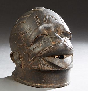 African Carved Wood Lipico Mask, from Makavonde, Tanzania, H.- 11 in., W.- 7 in., D.- 11 in. Provenance: from the Estate of John C. McNeese, New Orlea