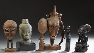 Group of Six African Items, 20th c., consisting of a carved wood mask with legs, Ashanti, Ghana; Carved Wood fertility offering figure, Nigeria; a car