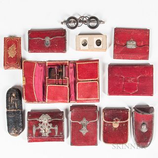 Group of Red Leather Cases, Wallets, and Necessary Kits