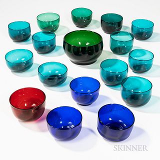 Sixteen Colored Glass Finger Bowls and a Larger Bowl