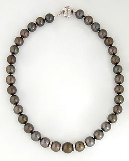 Graduated Strand of 35 Dark Gray Tahitian Cultured Pearls, ranging from 11-14 mm, the largest four pearls separated by diamond mounted spacers with a 