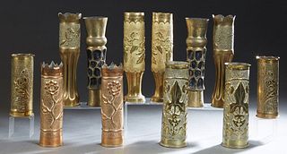Group of Twelve French Trench Art Vases, c. 1918, consisting of six pairs, all with repousse decoration, Tallest- H.- 12 in., Dia.- 3 1/2 in. (12 Pcs.
