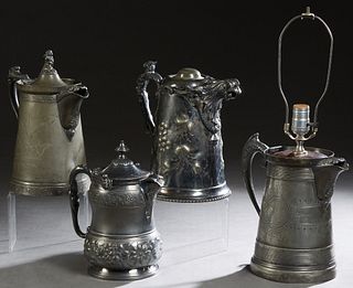 Group of Four American Silverplated Water Pitchers, late 19th c., one with a putto handle on the lid; one quadruple plate with an eagle spout and repo