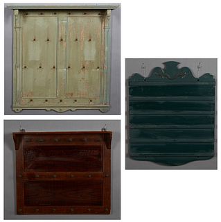 Group of Three Wall Mount Boards, 20th c., one mahogany for mugs; one green for hymnal numbers; and one green with hooks, perhaps for shaving mugs, La
