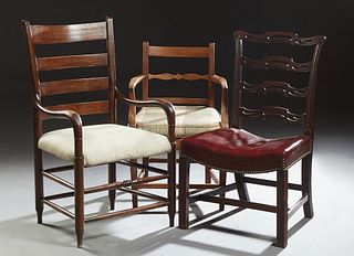 Group of Three English Carved Chairs, 19th c., consisting of a Chippendale style mahogany armchair, with a horizontal splat over a wooden seat on tape