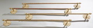 Set of Four Victorian Style Brass Curtain Rods, 20th c., the floral backplates issuing a bracket joined by a twisted rod, H.- 4 1/2 in., W.- 41 1/2 in
