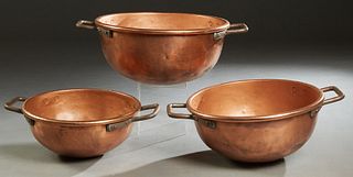 Set of Three Graduated Copper Mixing Bowls, 19th c., with iron handles, Largest- H.- 10 1/2 in., W.- 29 in., D.- 21 1/2 in.