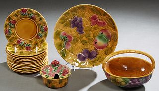 French Provincial Sixteen Piece Majolica Fruit Set, 20th c., by Sarraguemines, consisting of thirteen plates, a large platter, a handled basket and a 