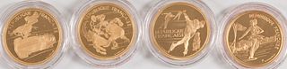 Four Albertville 500 Franc gold coins.