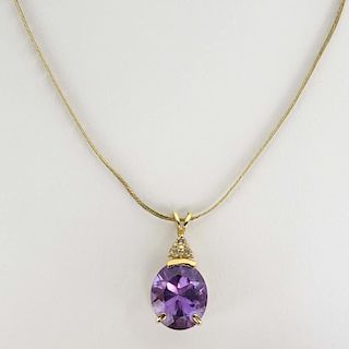 Lady's Vintage 14 Karat Yellow Gold and Oval Cut Amethyst Pendant Necklace.
