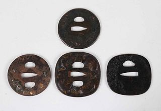 Four Japanese Bronze and Iron Tsuba