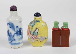 Three Chinese Stone and Porcelain Snuff Bottles