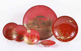 Six Japanese Parcel-Gilt Red Lacquered Plates