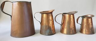 Set of 4 Antique Copper Graduated Pitchers