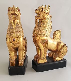 Pair of Carved and Gilt Tibetan Foo Dogs