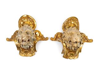 A Pair of English Part Silvered Giltwood Lion MasksHeight 20 x width 26 inches.