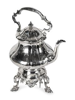 A Victorian Silver Hot Water Kettle-on-Stand
Height 17 1/4 inches.